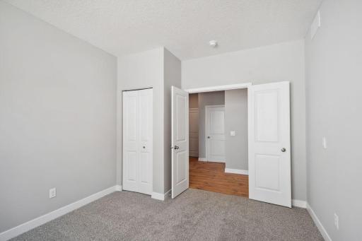 With French doors on a bedroom, it's easily converted to a home office or flex room space. *Picture is of model home; actual finishes may vary.