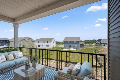 Finished, covered deck makes a great space for your morning coffee or your favorite evening beverage. *Picture is of model home; actual finishes may vary.