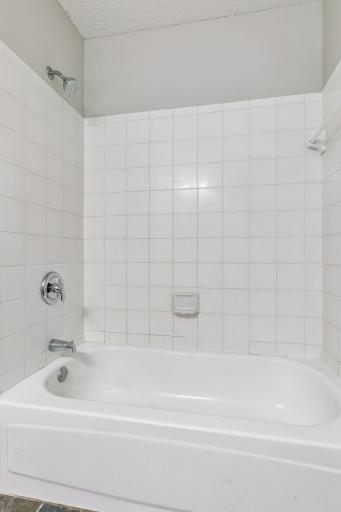 Brand new faucet, handle and shower head.