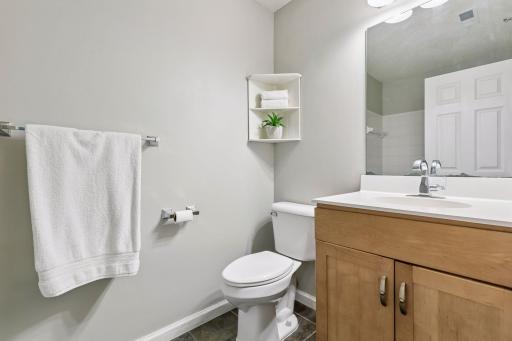 Guest bathroom with tub/shower.