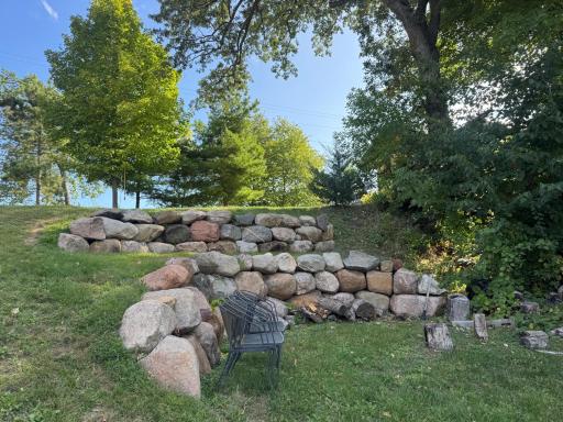 Teared boulder wall & campfire setting