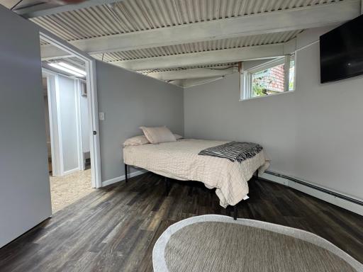 Lower level bedroom was two bedrooms but now made into one.
