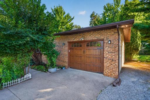 Rounding out the main level is access to the oversized attached one-stall garage.
