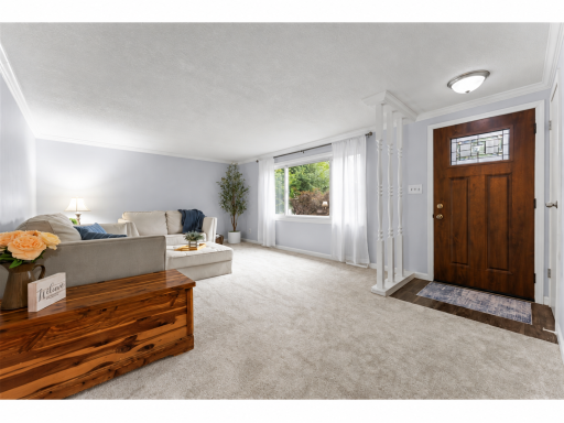 A look at the front entrance and living room