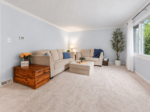Spacious living room with a large picture window.