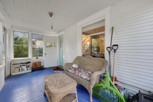 The south-facing front porch is a charming spot to relax and unwind.