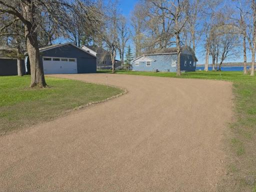 Private gravel driveway, newly built in November 2025, providing convenient and secluded access to the lake home.