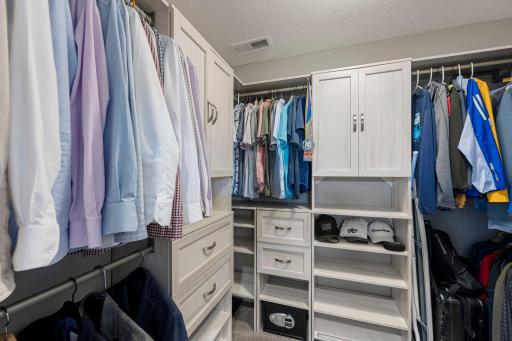 A look at 8x6 walk-in closet with built-ins.