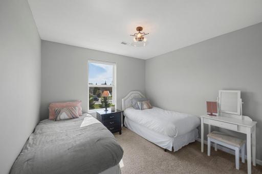 Bedroom two offering carpeting and ample closet space.