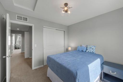 Bedroom three is located directly next to bedroom two.