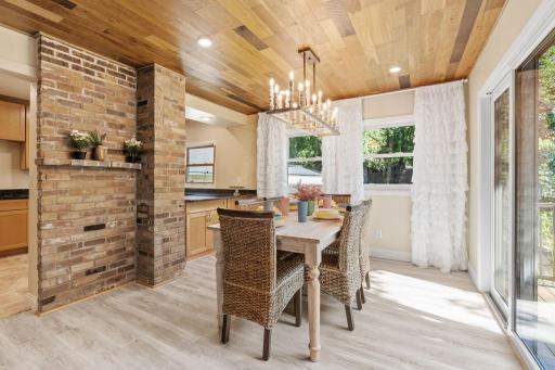 Stunning open concept with original brick chimney