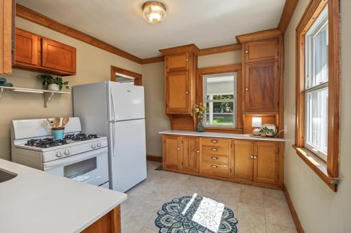 Updated counter tops and original country kitchen cabinets!