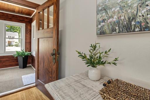 Solid oak front door with original hardware.
