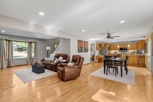 View of the main level - functional and open floor plan with informal dining area and an updated kitchen.