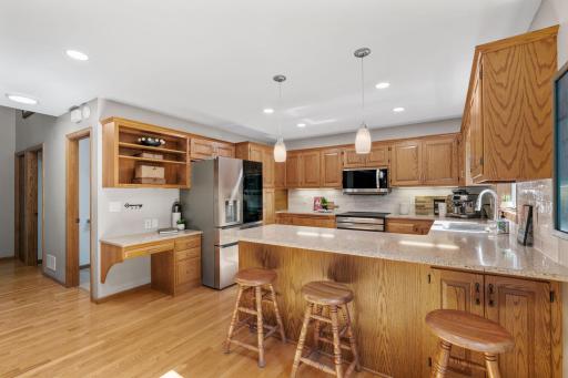 View of the spacious kitchen. Enjoy the pennisula as a breakfast bar and additional prep space.