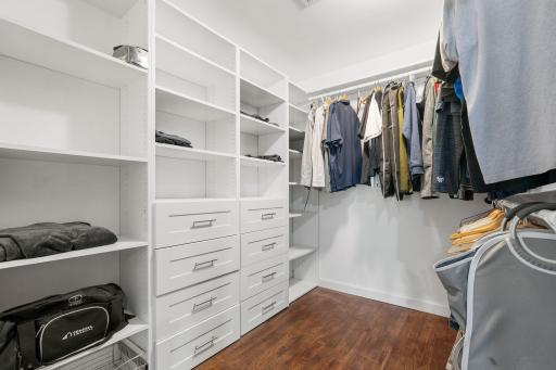 The primary closet with custom closet system!