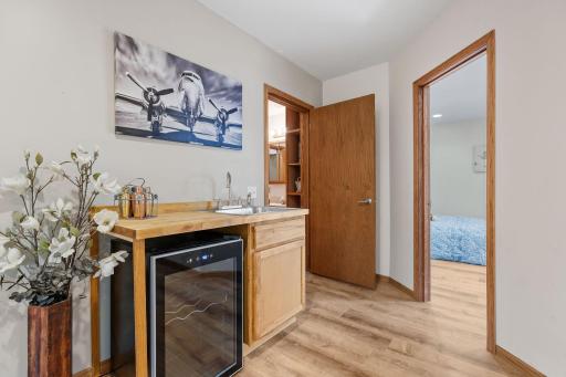 Lower level features a wet bar - great as a snack station or drinks for hosting game parties or movie nights.