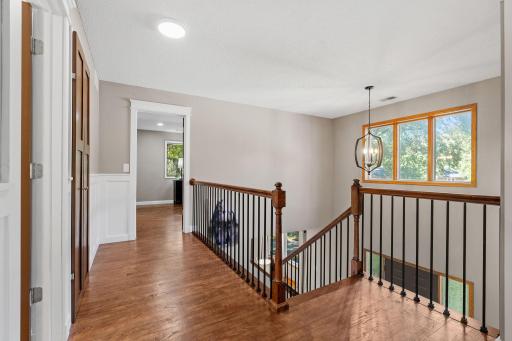 Make your way up to the upper level featuring updated wood flooring, new craftsman style doors, trim and moulding.