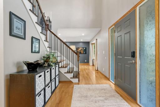 The foyer! 2 story ceilings with plenty of space to welcome guests.
