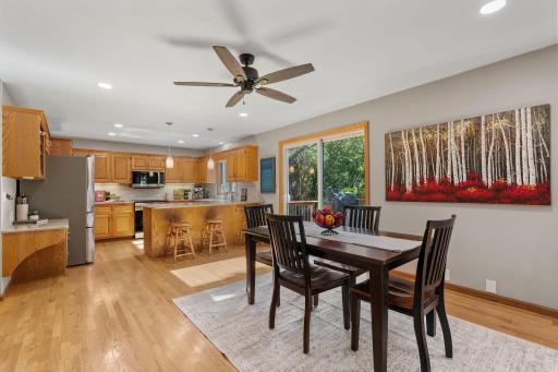 Dining area conveniently located near kitchen and deck access - easy for grilling!