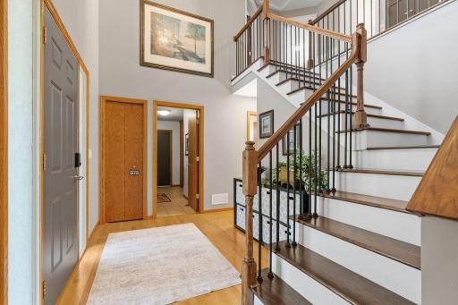Additional view of foyer, coat closet and mudroom leading to interior garage access