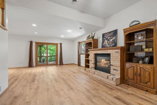 View of lower level living area & gas fireplace