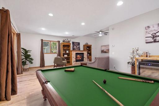 Additional view of large lower level living space - virtually staged.