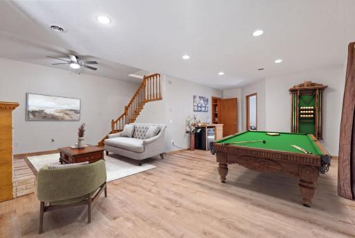 Entertainment sized lower level with room for family room and game area! Room is virtually staged.