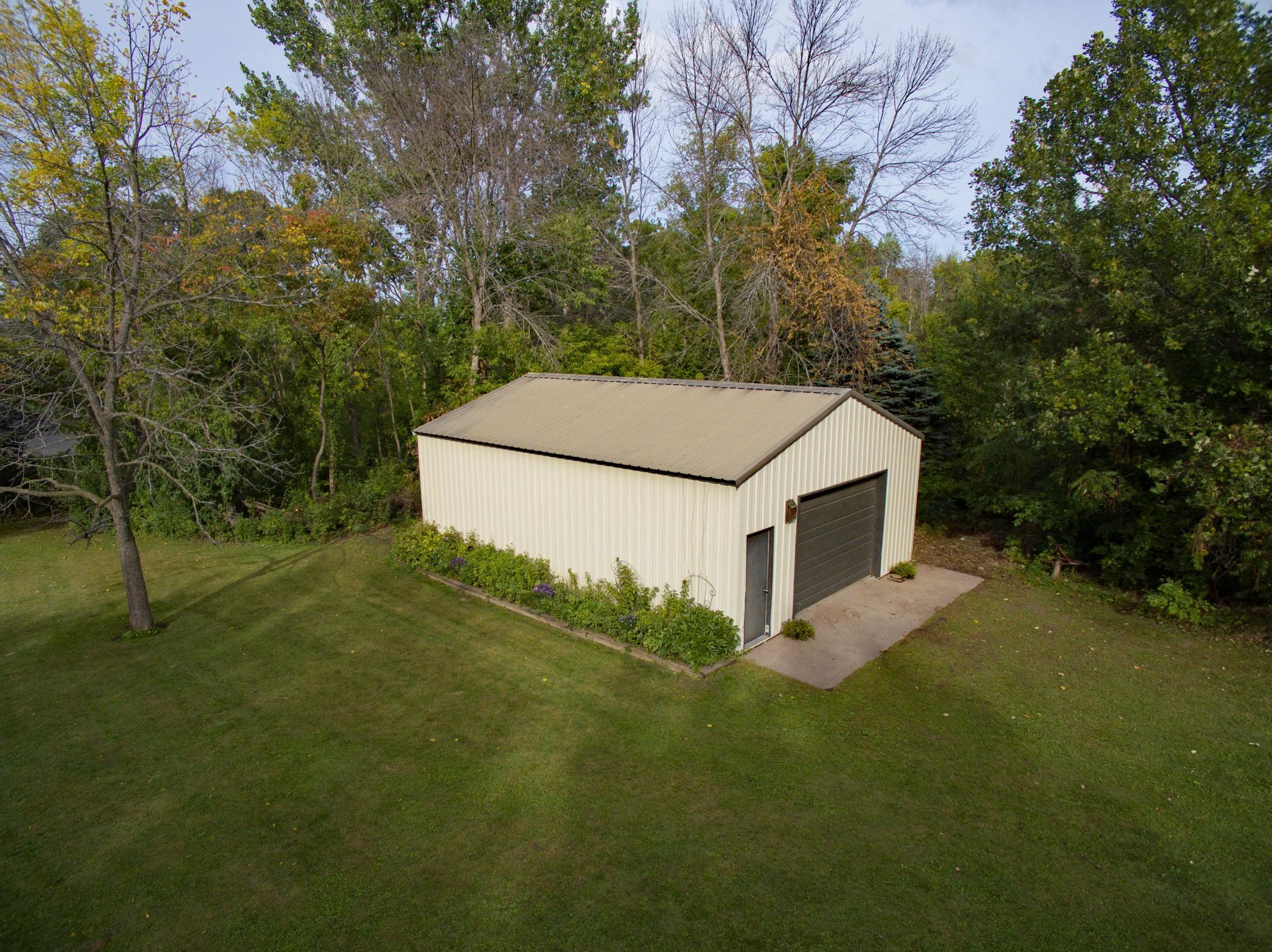 The property offers a 32' x 24' outbuilding in addition to the attached 3-car garage.