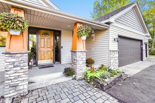 A full length porch graces the front of the home.