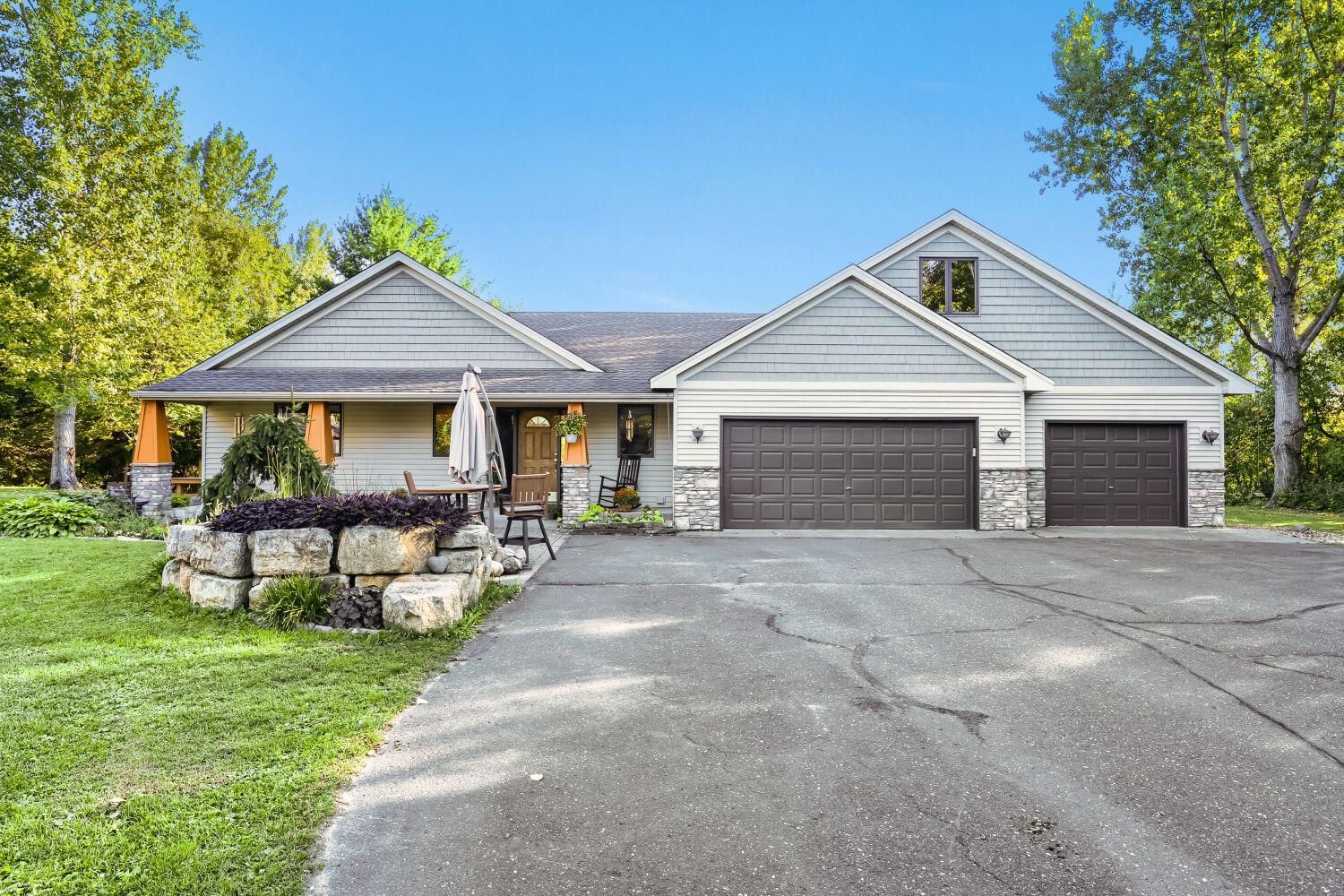 3 car attached garage with bonus room above.