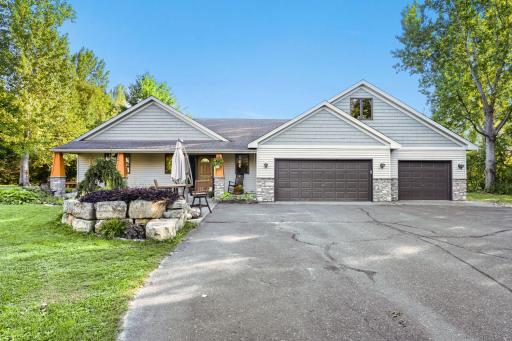 3 car attached garage with bonus room above.