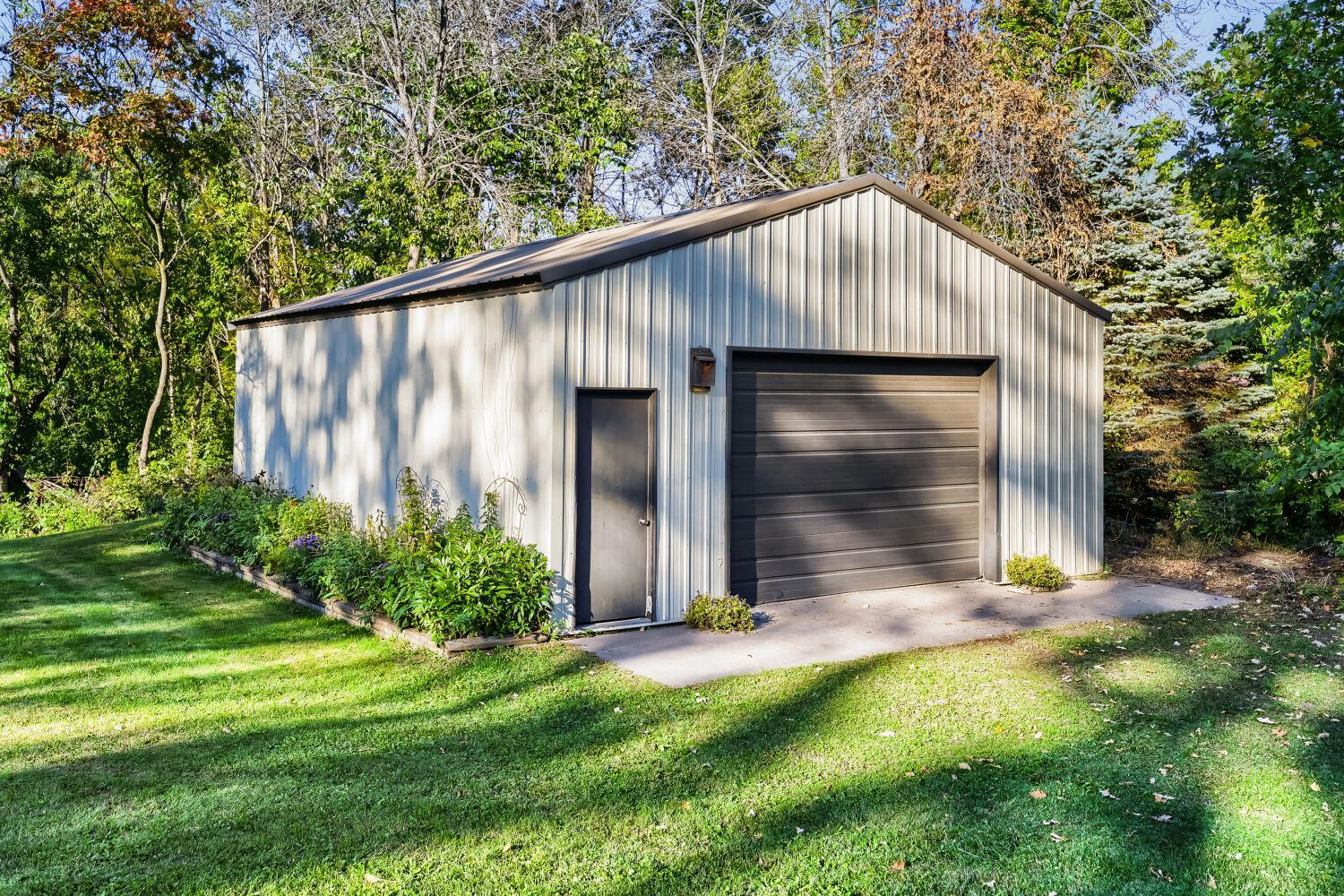 Bonus 32' x 24' outbuilding with cement floor.