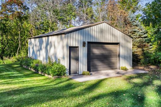 Bonus 32' x 24' outbuilding with cement floor.