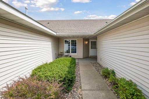 A peaceful and private front walkâa lovely spot to enjoy your morning coffee.