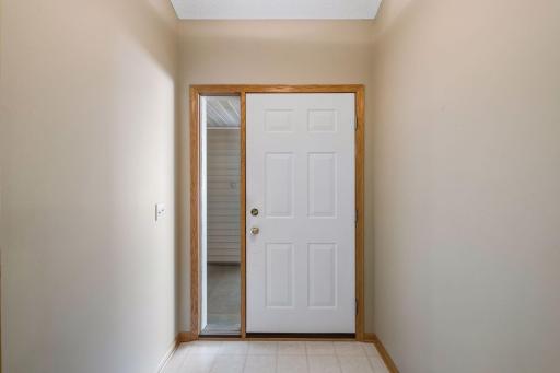 Welcome inside! The front foyer provides an inviting introduction to this beautifully cared-for home.