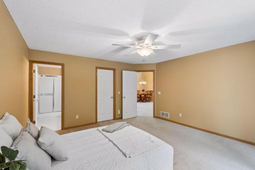 Another view of the primary bedroom with plenty of space to create your own comfortable retreat.