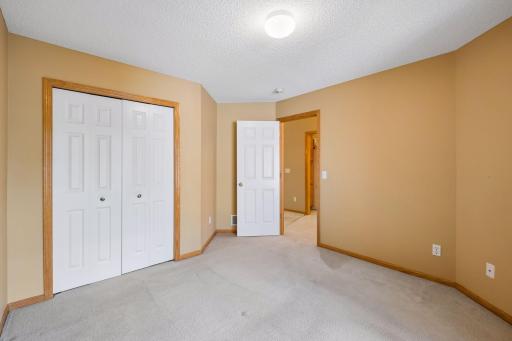 Another view of the second bedroom featuring a large closet for plenty of additional storage.