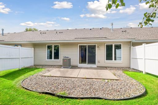 Your backyard patio awaits! Step right outside from the sunroom and enjoy easy indoor-outdoor living.