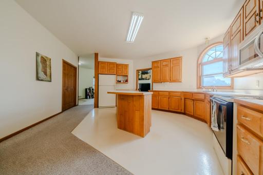 Dining to kitchen, entry, living