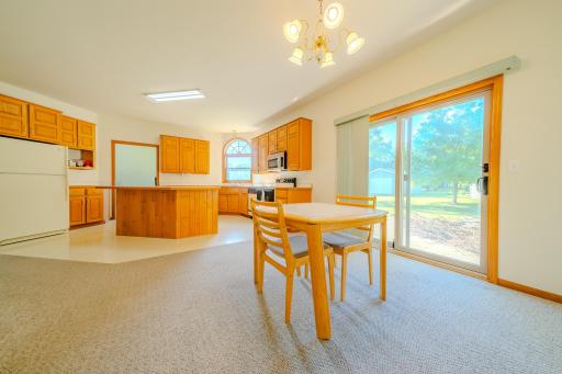 Dining, sliding door to yard, kitchen