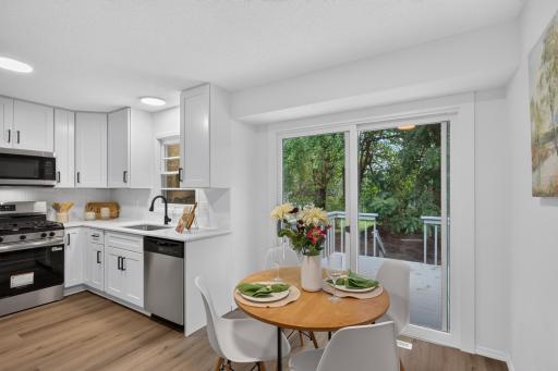 Dining area to deck and kitchen