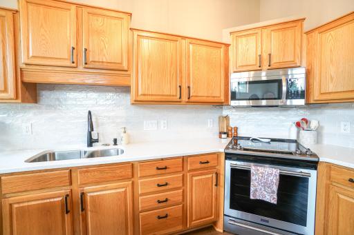 Designer backsplash with wired under lighting
