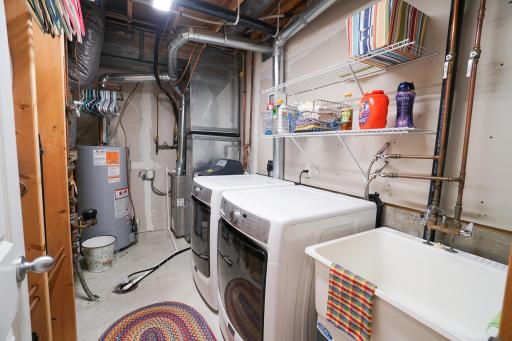 separate utility room, Washer and Dryer, owned water softener