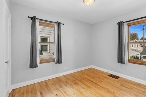 Main floor bedroom - newly refinished hardwood floors