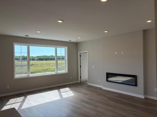 This sun-soaked living room is spacious enough for even the biggest get togethers.