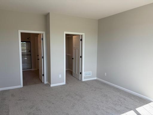A reverse look at the owner's suite shows a separate bathroom and shower.