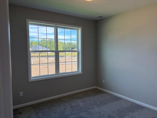 Showing the secondary bedroom which has more than enough room.