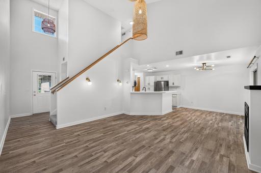 Make yourself at home in this spacious, open- concept living area
