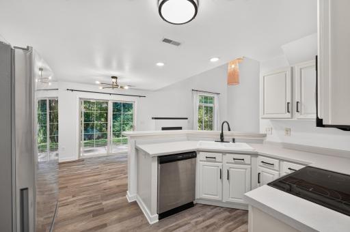 The kitchen features new stainless steel appliances